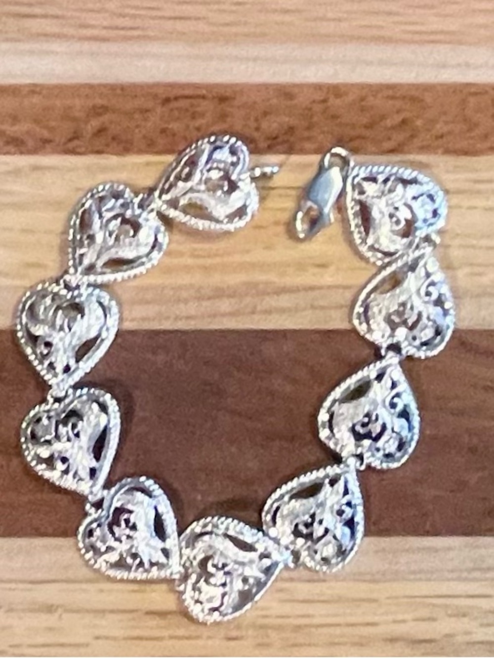 VG 90’s stamped 925 filigree heart /Rose motif link bracelet. 7” WT 9.9 grams